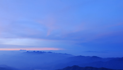Fototapeta na wymiar Morning Mist at Tropical Mountain Range, Chiangmai,Thailand