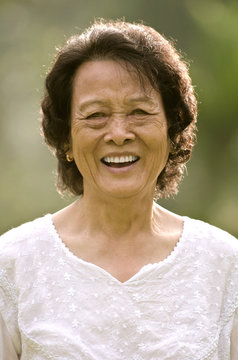 senior asian woman smiling