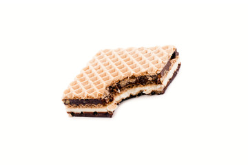 Layered chocolate wafer bitten.