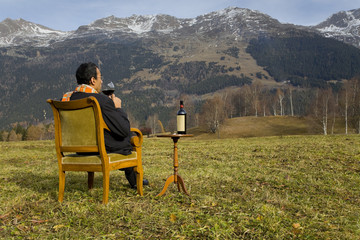 Businessman enjoying nature and wine