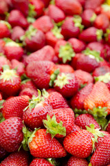 strawberries background fruits focus on foreground