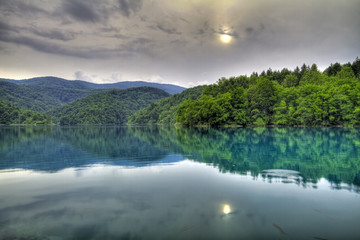 Forest lake with reflections.
