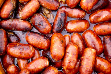chorizo red sausages fried in oil