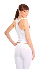 Back of a young and sexy brunette in white sporty clothes