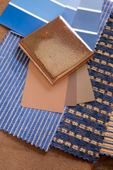 Blue and brown swatches with a ceramic tile