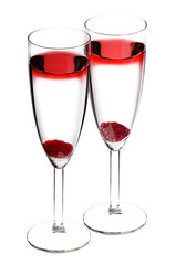 Designer cocktail isolated over white with raspberry