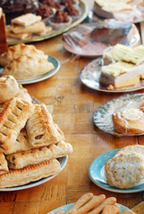 table of food shallow Dof focus on sausage rolls