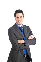 Smiling businessman with arms crossed