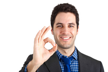 Smiling businessman showing ok sign