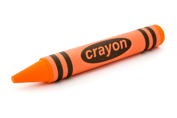 Obraz premium Single orange crayon isolated on white