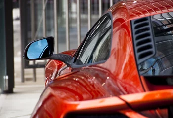 Photo sur Aluminium Voitures rapides Detail of an orange sports car