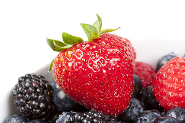 A group of fresh berries in a bowl