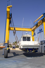 boat crane travelift lifting motorboat