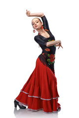 young woman dancing flamenco with castanets isolated on white - obrazy, fototapety, plakaty