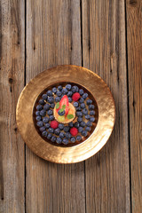 Custard filled puff pastry and blueberries