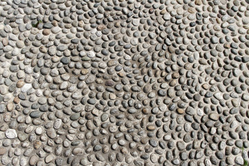 Stones in concrete.