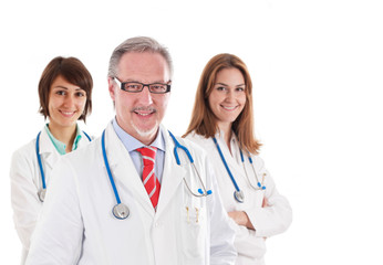 Fototapeta premium Group of smiling doctors isolated on white