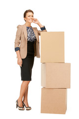 attractive businesswoman with big boxes