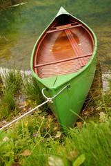 green boat and lake © Amir Bajric