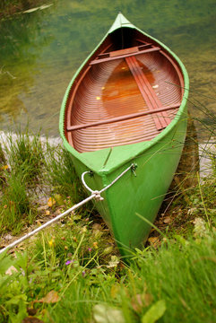 green boat and lake