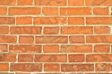 A brick wall of an old house