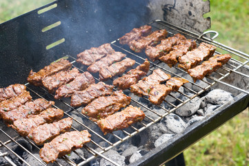 Traditional Croatian cevapcici on the grill