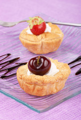 Fruit tarts with whipped cream