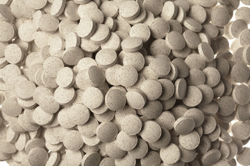 pills and vitamins on white