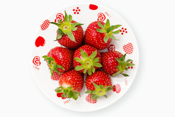 Deliciously red strawberries romantic plate