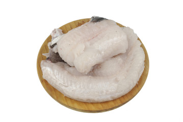 Merluza limpia sobre plato de madera