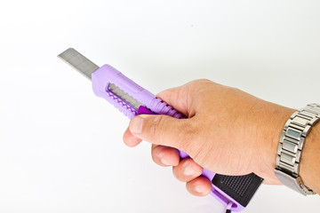 cutter in a man's hand