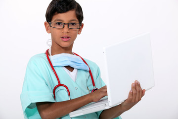 Boy dressed as a surgeon