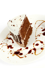 Chocolate cake on a white plate
