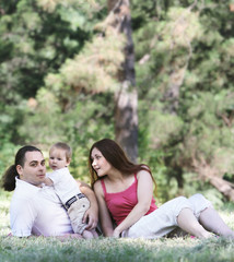 young family on natural background