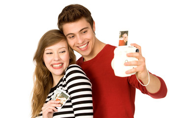 Young couple with instant camera