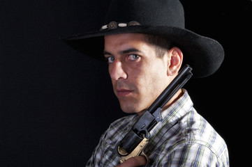 cowboy with hat and revolver