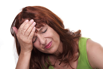 redhead woman with migraine