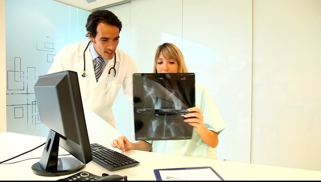 Doctor and nurse looking at Xray