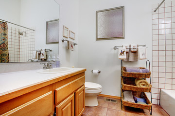 Bathroom with purple towels