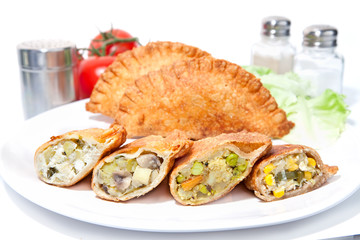 Various Crispy vegetable Samosas  serve on plate