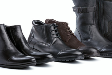 Male boots over white, all boots different