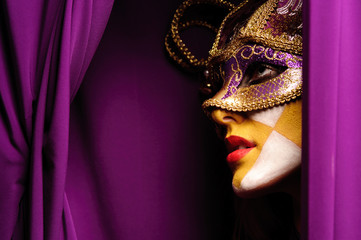 woman in violet mask