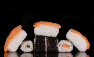 sushi rolls isolated on black