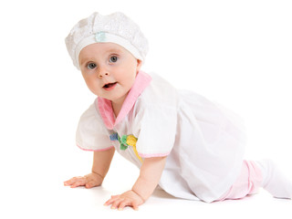 Baby in dress on a white background.