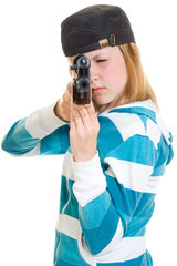 A teenager with a gun on a white background.