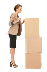 attractive businesswoman with big boxes