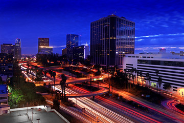 Fototapeta na wymiar Obraz Timelapse od Los Angeles autostrad na zachodzie słońca