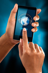 A woman use a mobile phone to listen music