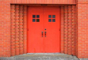 Red doors brick wall