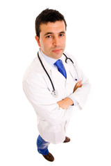 Full length of a young male doctor standing against white backgr